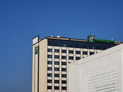 A clean hotel against the blue sky
