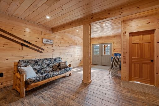 A living room interior of log cabin in mountains