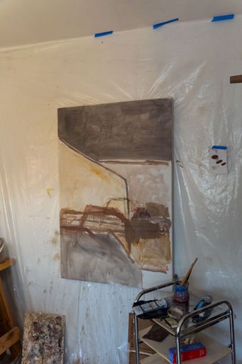 A studio or workspace of an artist doing oil painting