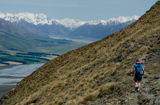 A closeup shot of a male walking at Peak Hill, Arthur's Pass, New Zealand