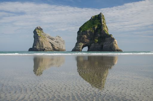 The beautiful view of the Archway Islands, Puponga, New Zealand