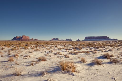 Red sandstone formations of Navajo Nation's Monument Valley Park in Arizona, US