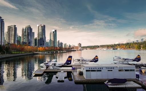 A high angle shot of seaplanes parked near the Seaplane Tours base in Coal Harbour, Vancouver