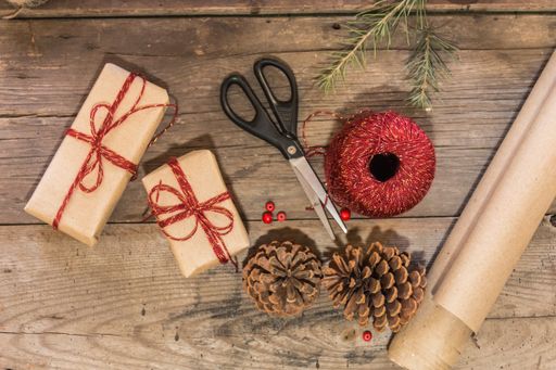 scissors paper and threads for making Christmas gifts