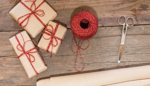 scissors paper and threads for making Christmas gifts