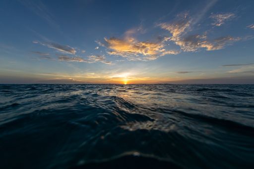 A breathtaking scenery of the sun setting over the ocean in Bonaire, Caribbean