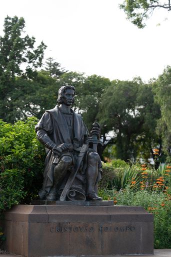 A vertical shot of the Cristovao Colombo statue at a park in Madeira Portugal