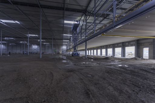 A view inside a new empty industrial warehouse prepared for operation