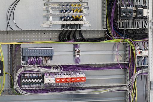 A closeup shot of control panel with wiring