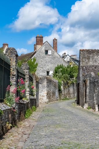 Senlis, medieval city in France, typical cobblestone street with ancient houses