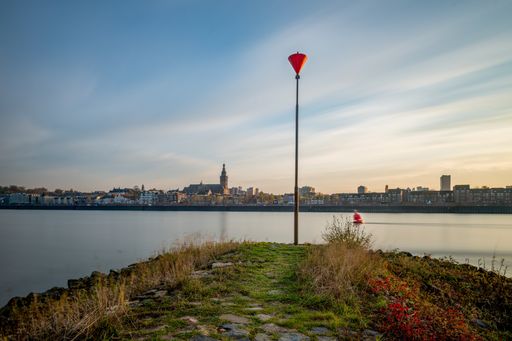 A beautiful view of the Waal river with Nijmegen city in the background captured in Netherlands