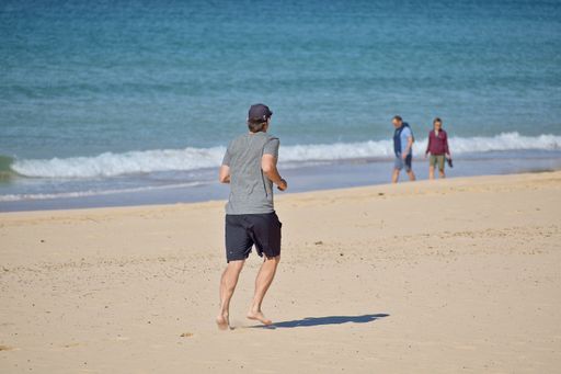 Sydney / Australia - May 11 2019: View of people walking at Manly Beach