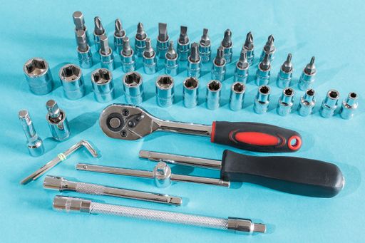 A set of repairitools on a blue background