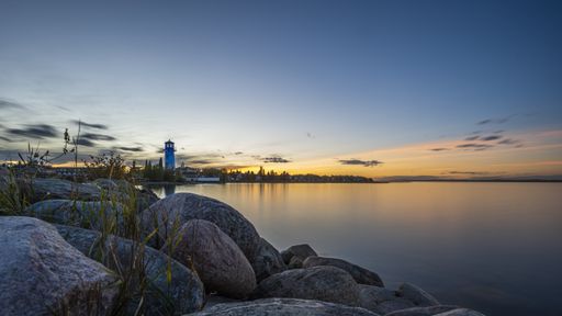 A beautiful shot of the rocky coast during sunset near Sylvan Lake in Alberta, Canada