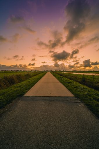 A stunning shot of a rural highway in Zeeland, the Netherlands