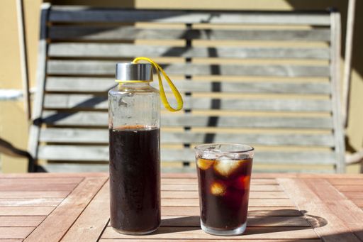 A selective focus shot of ice cold brewed coffe on table