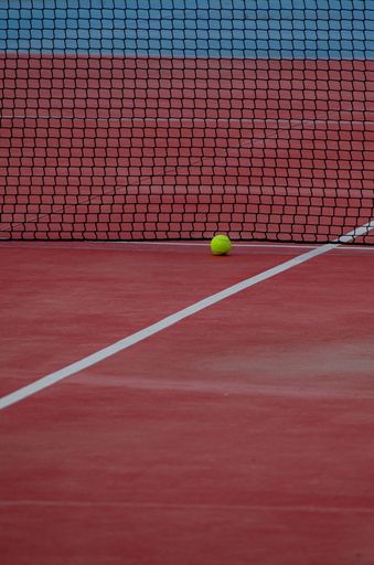selective focus, two balls on a tennis court. sports courts
