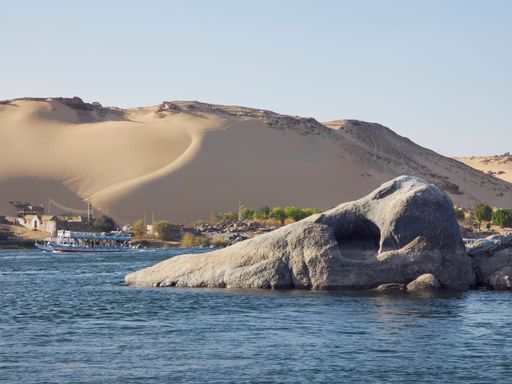 An aerial view of Nile river and surrounded by sandy hills