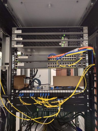 A vertical closeup shot of different IT and server equipment