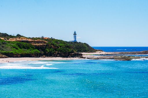 A scenic view of an activNorah Head Lighthouse on a Central Coast, New South Wales, Australia