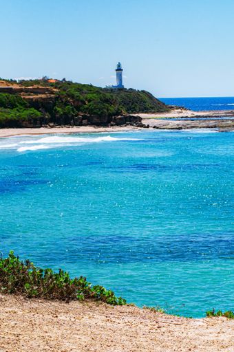 A scenic view of a Norah Head Lighthouse on a Central Coast, New South Wales, Australia