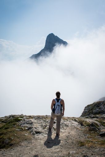 woman looking at a mountain in Picos de Europa, Spain