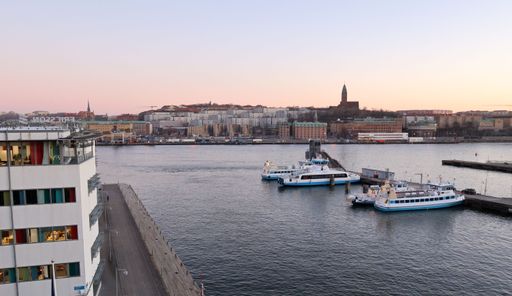 A high angle shot of a boats moored on a dock in Gothenburg, Sweden