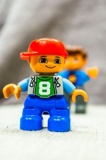 Lego Duplo toy boy figurine with number eight