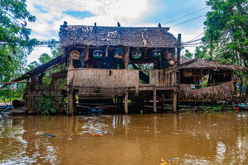 A nice hangout spot at a polluted lake surrounded by a green scenery in Cambodia in Asia