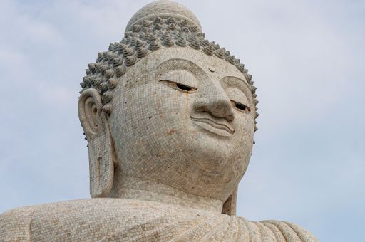 A low angle shot of the historic famous landmark called Big Buddha in Phuket island in Thailand