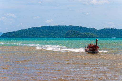 Longtail boat and seascape in the Ao Nang bay in Thailand south east asia
