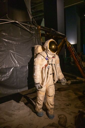 A vertical shot of the replica of Apollo 11 with Buzz Aldrin in Science Museum London