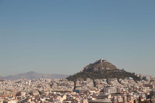 A beautiful view of Mount Lycabettus and Kolonaki district from the Areopagus Hill, Athens, Greece