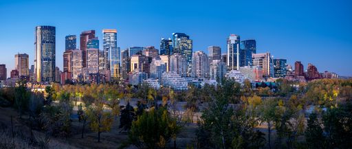 Panoramic view of Calgary Alberta's skyline before sunrise on a clear autumn morning.