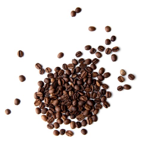 A closeup shot of freshly roasted coffee beans on a nice white background