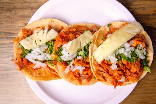 A top view of traditional Mexican pork tacos