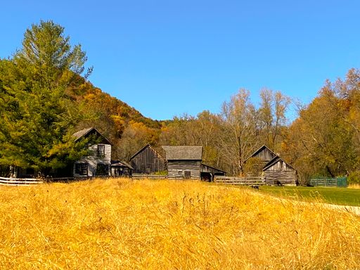 The old wooden houses in a rural area in Autumn