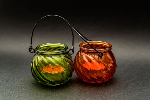 Colorful lantern jars on a black background