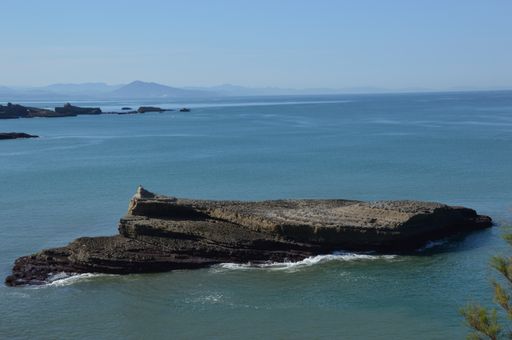 A rock formation in the sea, seascape at tide at the coast of Biarritz in the Bay of Biscay