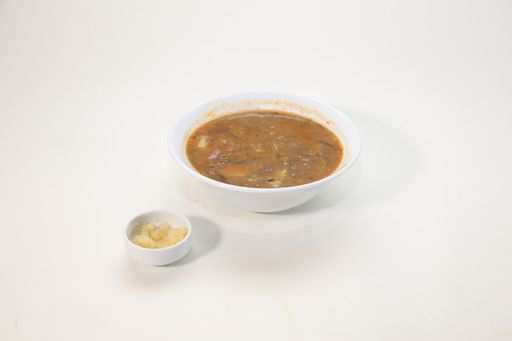 A bowl of traditional Armenian bean soup Alagyaz isolated on a white background