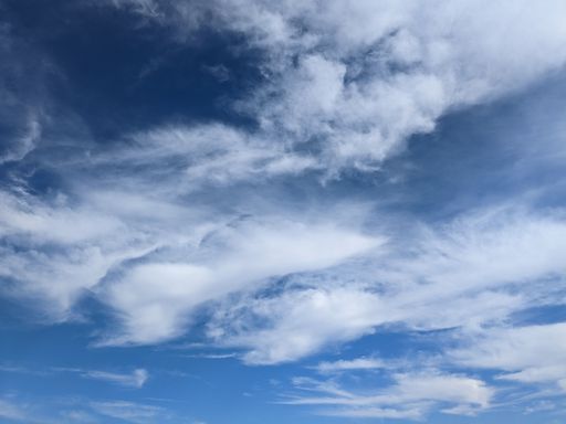 A stunning shot of the beautiful blue sky with white clouds