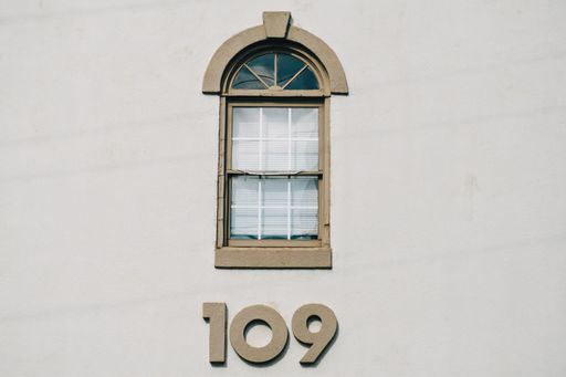A closeup shot of the window with number 109.