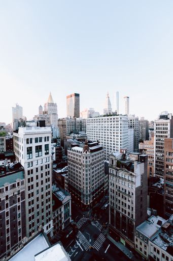 A vertical shot of the buildings and skyscrapers in New York City, United States
