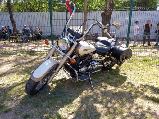 Lanus, Argentina - Sept 24, 2022: shot of a classic Yamaha DragStar bagger cruiser motorcycle in a park.