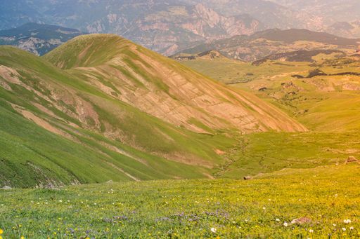 A beautiful shot of high hills and mountains in the early morning