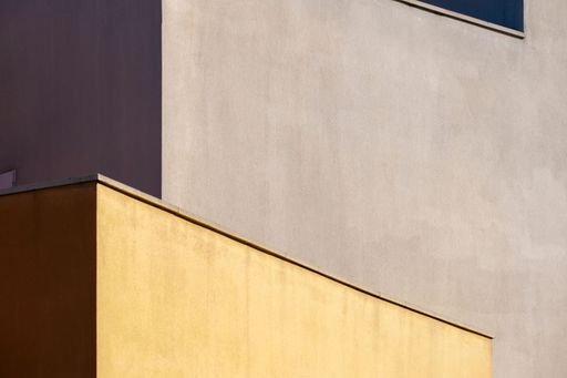 Detail of the facade of a building with geometric shapes and colors