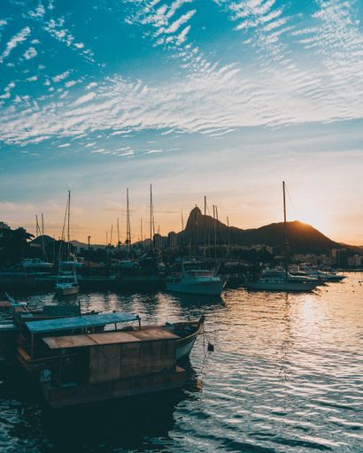 A vertical shot of the beautiful sunset view from the port of Urca, Rio de Janeiro