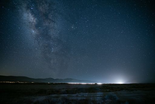 A landscape of Negev under a breathtaking starry sky at night in Israel - great for wallpapers