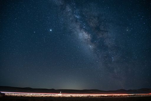 A landscape of Negev under a breathtaking starry sky at night in Israel - great for wallpapers