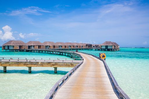 A blissful shot of bungalows and a jetty walk in beautiful Maldives